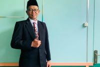 Kepala DPK Blora, M. Toha Mustopa di ruang kerjanya. 
