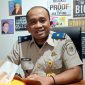 Kepala Subbagian Tata Usaha BPN Blora, Elvyn Bina Eka Kusuma di kantornya.